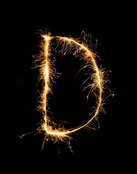 Feu d'artifice scintillant alphabet D (lettres majuscules) la nuit — Photo