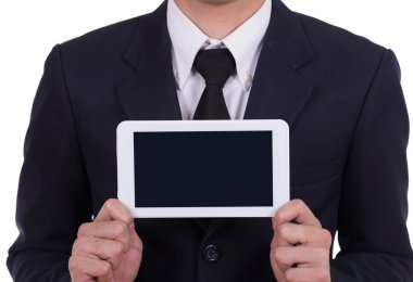 Bir küçük tablet dokunmatik bilgisayar tutan işadamı