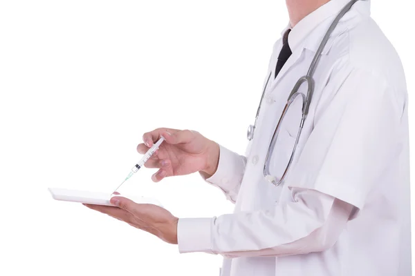 Doctor give injection to small tablet computer — Stock Photo, Image