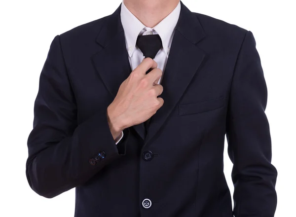 Businessman in suit tying the necktie — Stock Photo, Image
