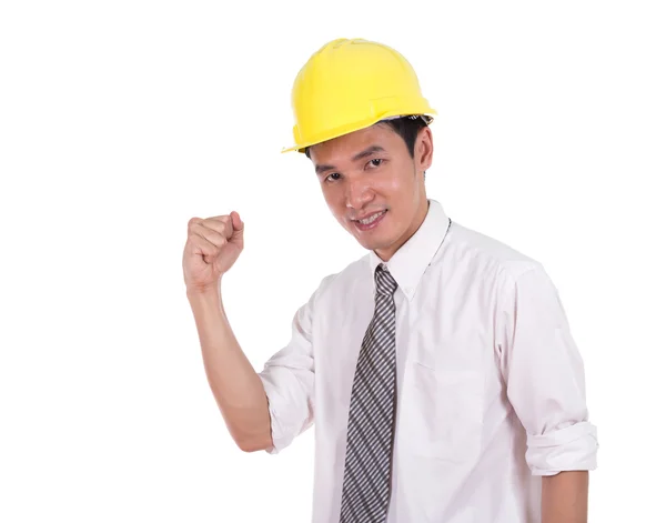 Feliz joven ingeniero celebrando con el brazo levantado, concepto de suc —  Fotos de Stock