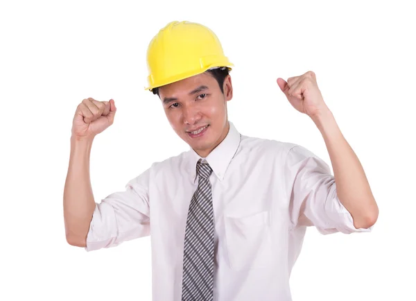 Happy young engineer celebrating with arm raised, concept of suc — Stock Photo, Image