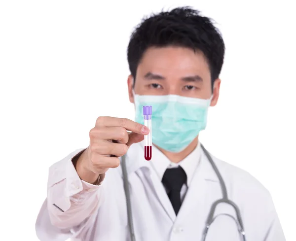 Doctor in mask research a medical test glass with blood — Stock Photo, Image