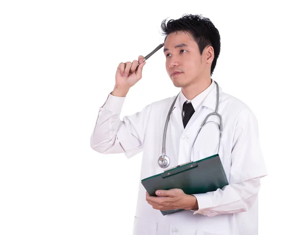 Doctor thinking with medical report — Stock Photo, Image