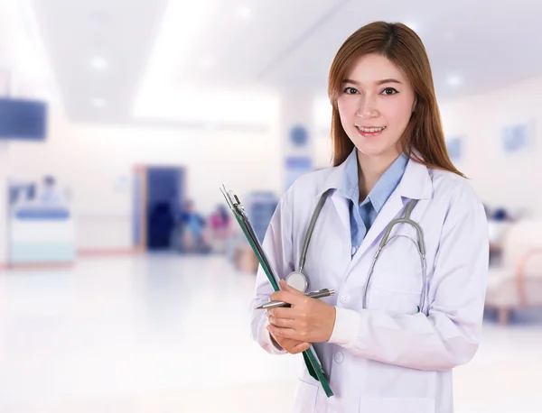 Female doctor with medical report — Stock Photo, Image