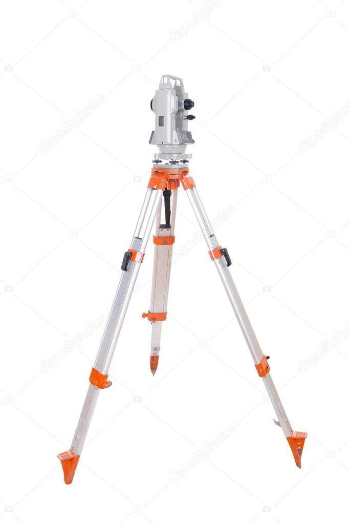Survey equipment theodolite on a tripod. Isolated on white