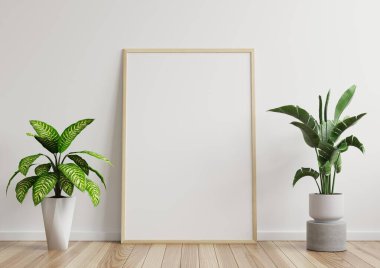 Odada fotoğraf çerçevesi, ahşap zeminde beyaz duvar, güzel desenler, yan 3D çerçeveli bitkilerle süslenmiş.