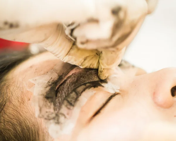 Makeup eyebrow tattooing, pretty asian woman face closeup — Stock Photo, Image