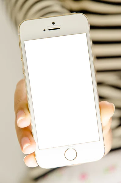 Изолированная женщина рука держа телефон планшет сенсорный компьютер гаджет — стоковое фото
