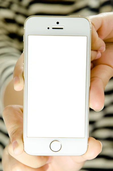 Изолированная женщина рука держа телефон планшет сенсорный компьютер гаджет — стоковое фото