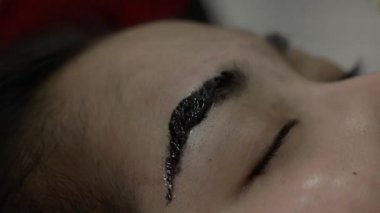 Dövme, güzel Asyalı kadın yüz closeup makyaj kaş