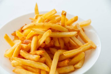 Crispy french fries served in a bowl kitchen food bright clean delicious snack