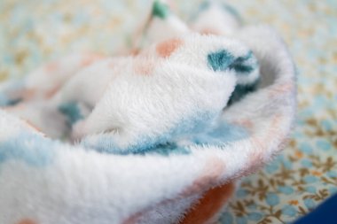 Soft blanket care routine indoor living room lifestyle cozy environment close-up view comfort concept