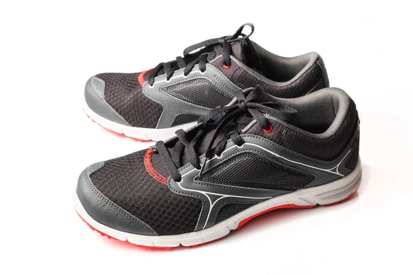 New unbranded running shoe color black and red, sneaker — Stockfoto