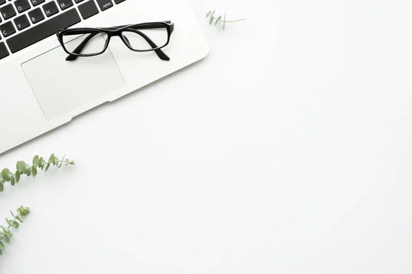 White Minimalist Office Desk Table Laptop Computer Eye Glasses Eucalyptus — Stock Photo, Image