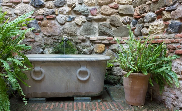 Classic Fountain Beside a Medieval Wall — Stock Photo, Image