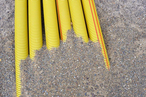 Tubos Plástico Amarelo Enterrados Areia — Fotografia de Stock