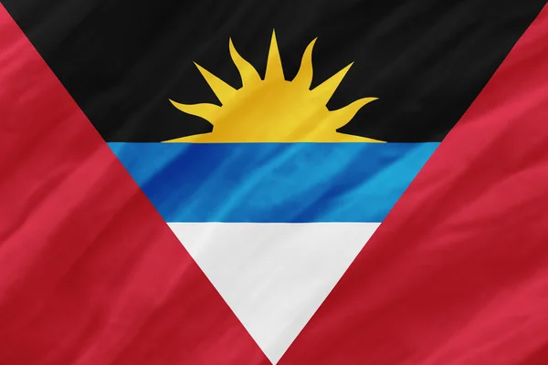 Hintergrund der welligen Antiguabarbuda-Flagge — Stockfoto