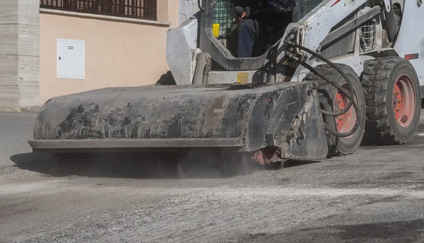 Sweeper bilagor minigrävare. — Stockfoto