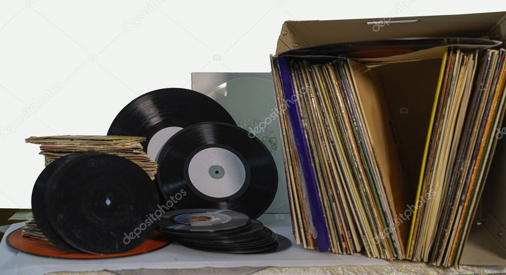 Pile of 45 and 33 RPM vinyl records used. And dirty even