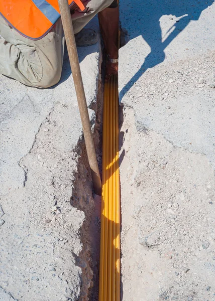 Worker Inserts Fiber Optic Cables Buried Micro Trench — Stock Photo, Image