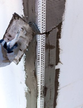 Şantiye - kurulumu dış yalıtım. Dış Cephe ısı yalıtımı durdurma ve Perdah ile çalışır