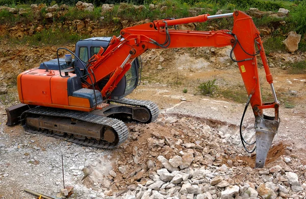 Large hydraulic Jackhammer Smashing Rocks — Stock Photo, Image