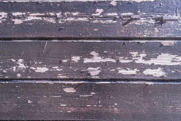 带有结和钉子孔的锈蚀风化谷仓木料背景 — 图库照片
