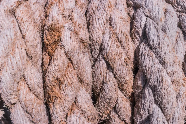 Close-up of an old frayed boat rope