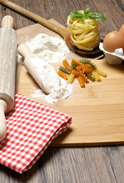 Pasta and ingredients for pasta — Stock Photo, Image