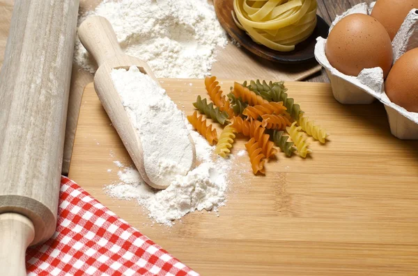 Pasta and ingredients for pasta — Stock Photo, Image