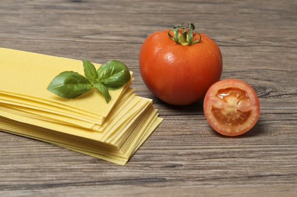 Pasta and ingredients for pasta — Stock Photo, Image