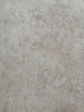 Modern betonu andıran desenli açık gri yüzey veya endüstriyel bitiş, arka plan, kentsel tasarım veya malzeme örnekleri için idealdir