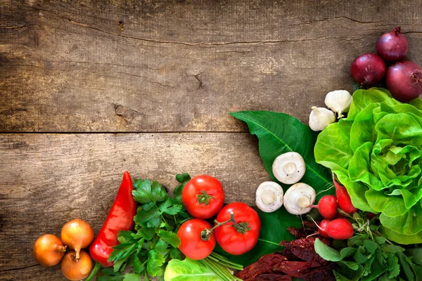 Fresh vegetables on wooden table — Stock Photo, Image