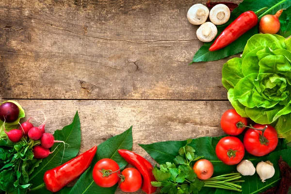 Fresh vegetables on wooden table — Stock Photo, Image