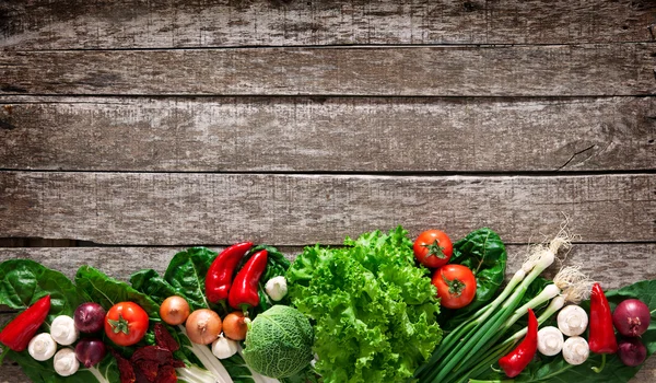 Fresh vegetables on wooden table — Stock Photo, Image