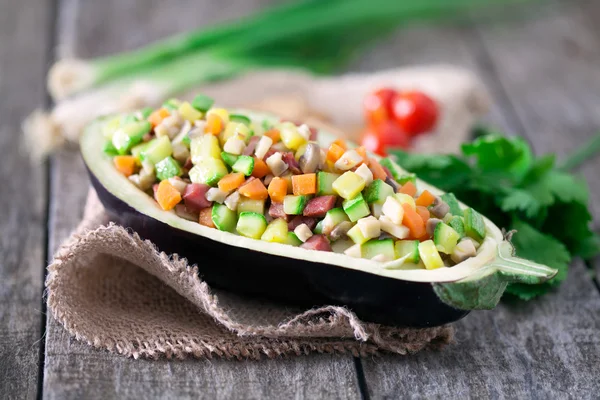 Salad served in eggplant's shell — Stock Photo, Image