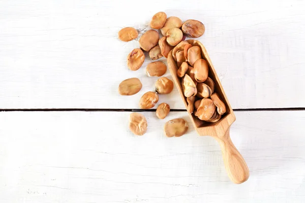 Wooden scoop of Beans — Stock Photo, Image