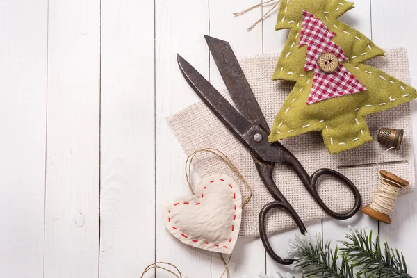 Vintage scissors surrounded by Christmas decorations, hand-made — Stock Photo, Image