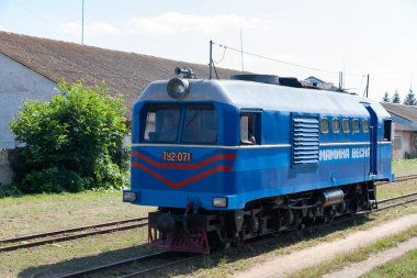 Bershad', Ukraine - July 10, 2021: Narrow gauge locomotive TU2 on the Bershad' railway station