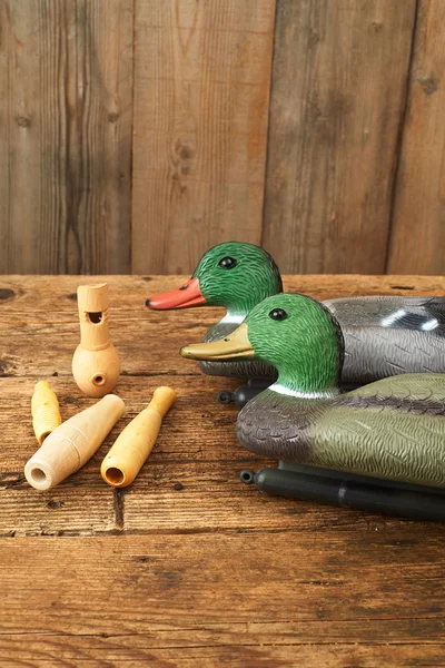 Hunting. Duck decoys and wooden whistles. — Stock Photo, Image
