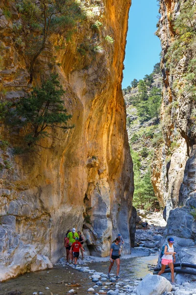 Samaria Gorge, Grece - MAY 26, 2016: Tourists hike in Samaria Gorge in central Crete, Greece. The national park is a UNESCO Biosphere Reserve since 1981