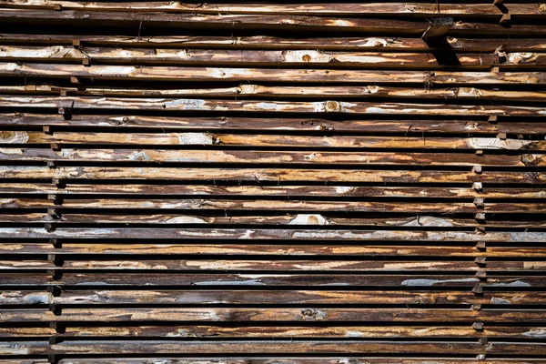 Dřevěné desky stack jako přirozené pozadí — Stock fotografie