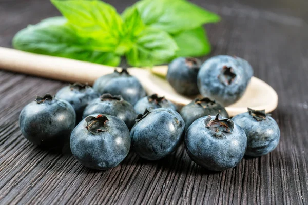 Blueberry on wooden board — Stock Photo, Image