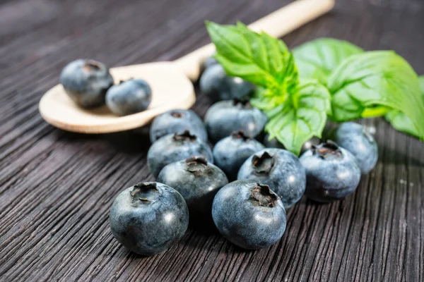 Blueberry on wooden board — Stock Photo, Image