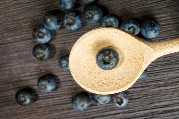 Blueberry on wooden board — Stock Photo, Image