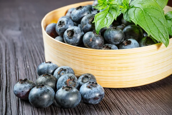 Blueberry on wooden board — Stock Photo, Image