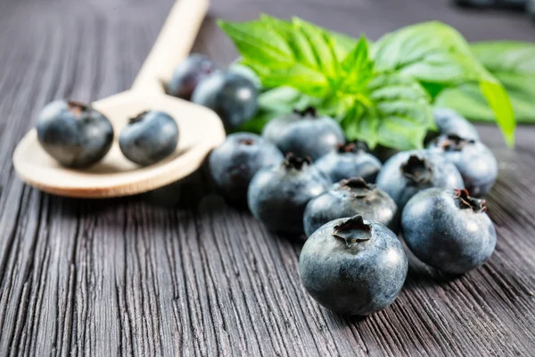 Blueberry on wooden board — Stock Photo, Image