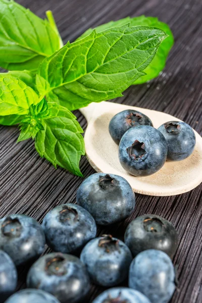 Blueberry on wooden board — Stock Photo, Image