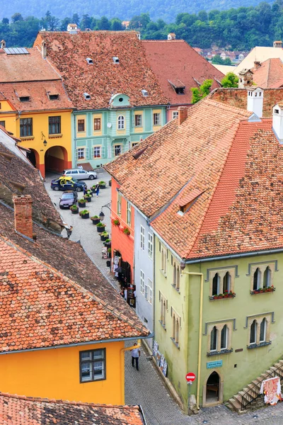 SIGHISOARA, ROMANIA - JULY 17: Aerial view of Old Town in Sighisoara, major tourist attraction on July 17, 2014. City in which was born Vlad Tepes, Dracula — Stock Photo, Image